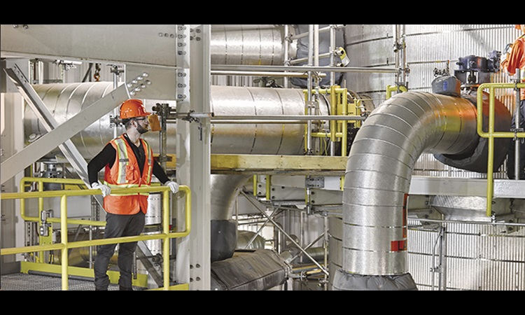 Employees working inside the Carbon Capture facility.