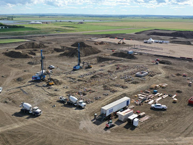 An aerial photo of the ground work occurring at the Great Plains project site. Many dirt piles and machinery are pictured. 